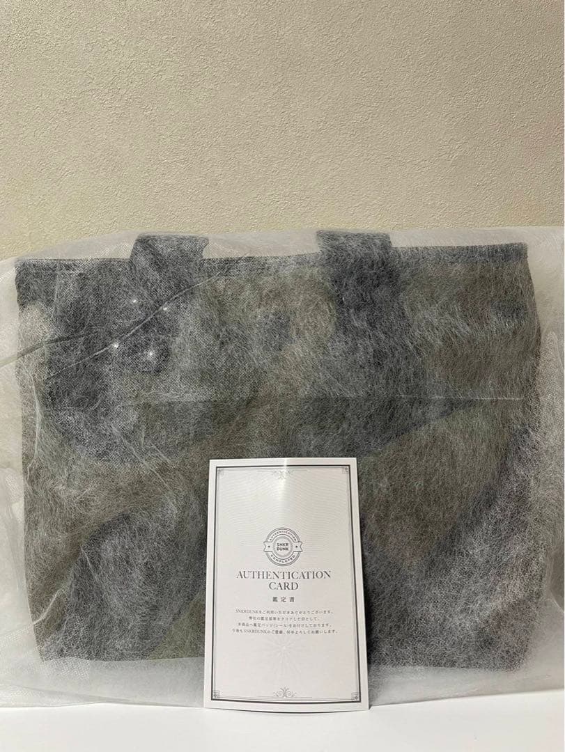 週末値下げ新品未使用sacai KAWS Bag \"Camo\"